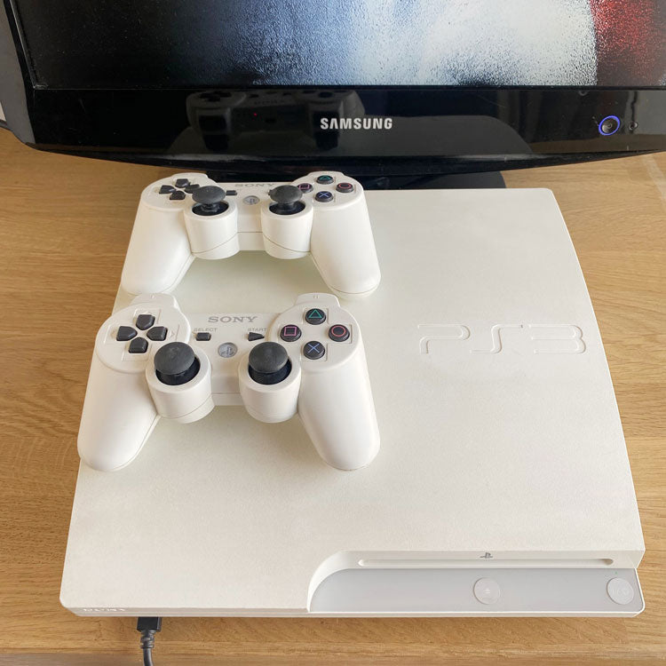 Sony playstation 3 with 2 online controllers