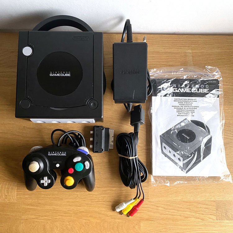 *Britton Schwallier, Hold For* SOLD:Nintendo DOL-001 Gamecube Console with popular Gameb