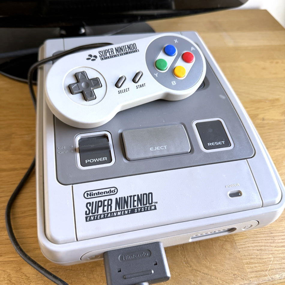 Console Super Nintendo + 2 jeux