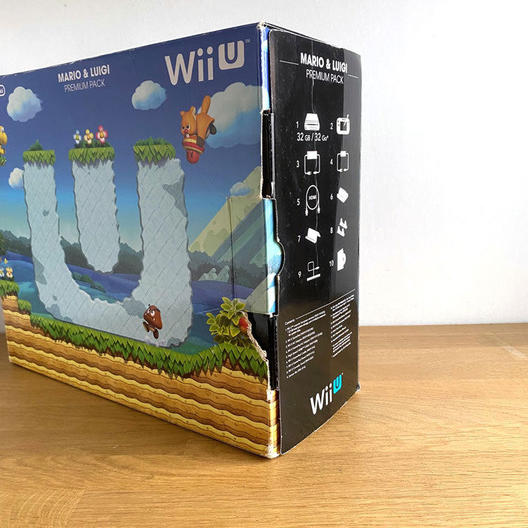 Nintendo Wii U Black Premium Pack (32GB) + New Super Mario Bros.U + New  Super Luigi U